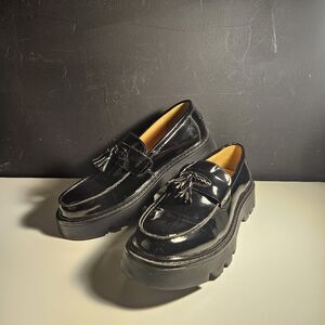 Black chunky tassel loafers